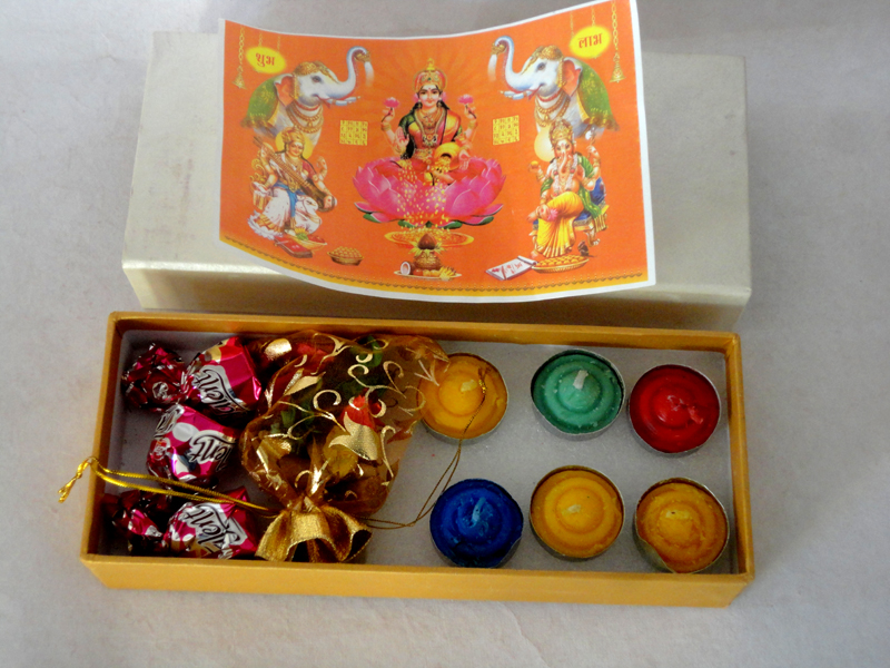 Diwali box with candies and candles